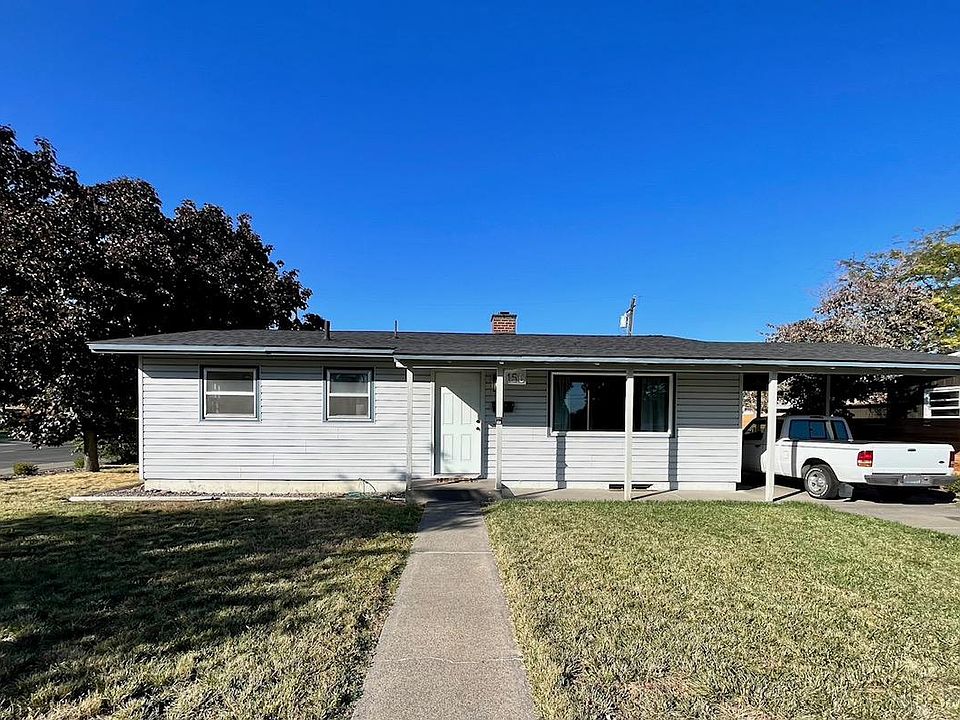 Front exterior of home, covered front porch, carport and off street parking