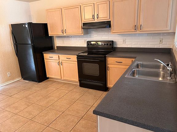 Kitchen with new Backsplash Stairs Going Up
