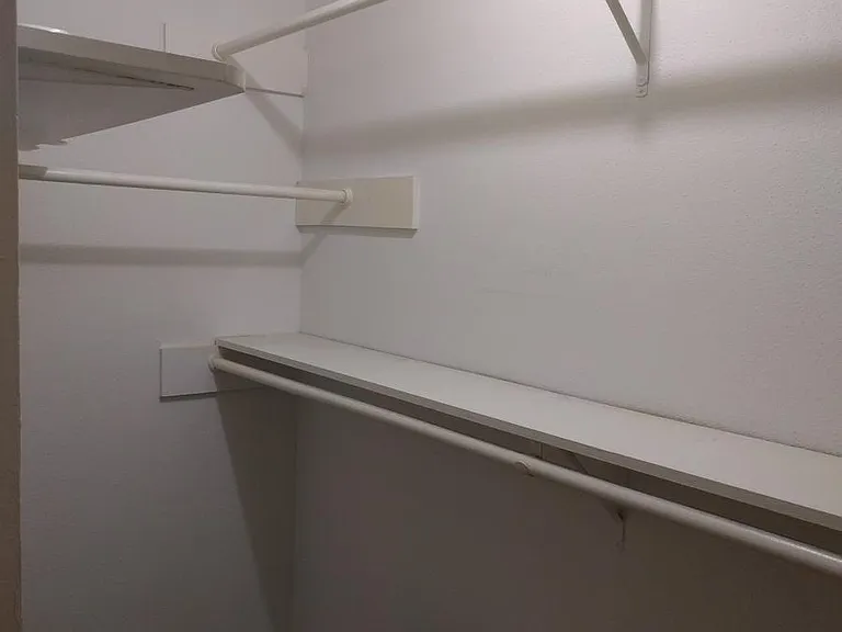Another view of the large walk in closet