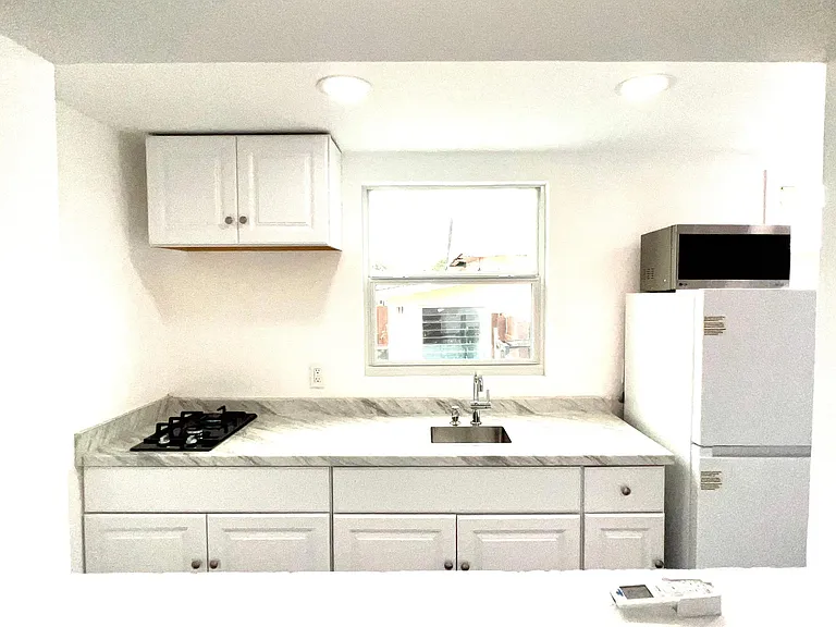 57 NW 48th Pl #5 — Photo 6