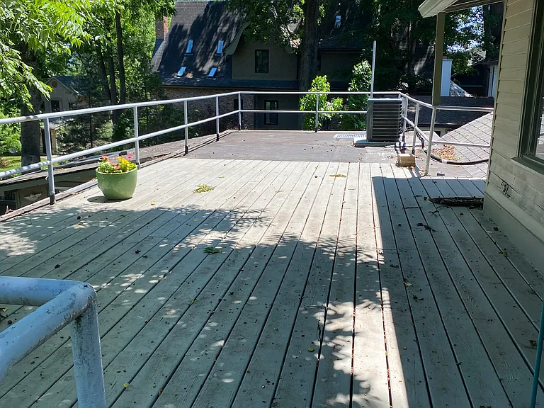 back deck. railing is not pet or child proof. allow indoor only cats. no dogs or small children.