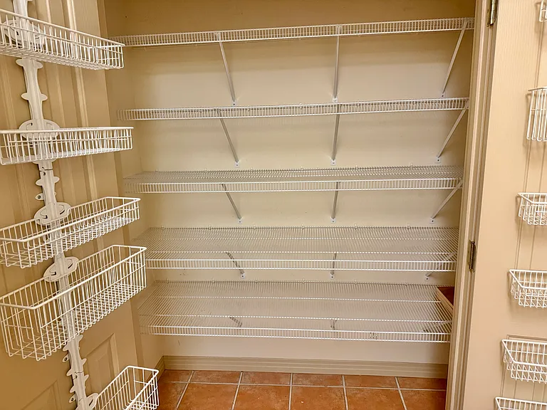 LARGE WALKIN PANTRY.