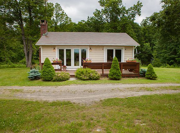 side of the house with the deck.