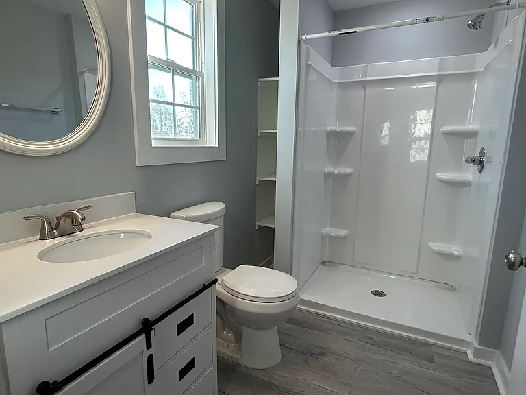 Full Bathroom located off the mudroom.