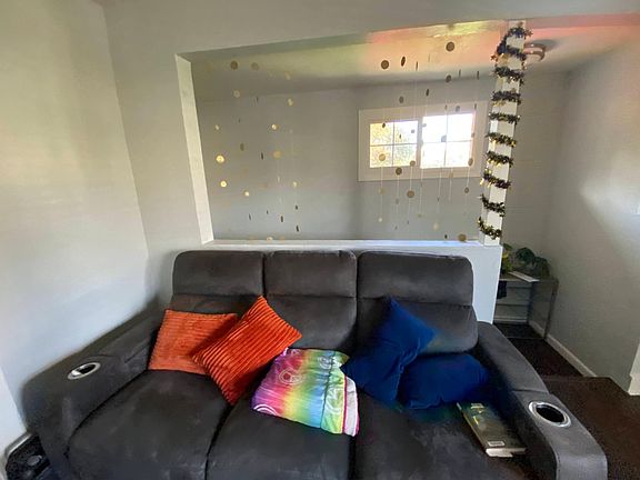 View of living room, plenty of space for a comfy couch