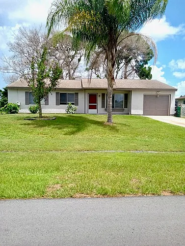 409 SE Jupiter Ter Photo 1