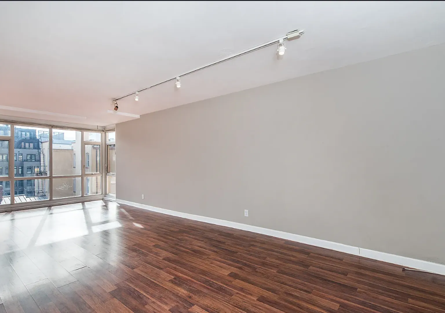 Bright fifth-floor one-bedroom in the heart of Dupont Circle with floor-to-ceiling windows and an... — Photo 3