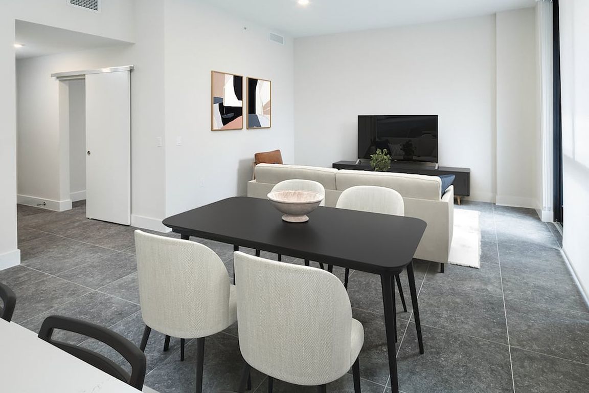 Signature Collection Townhome dining and living areas