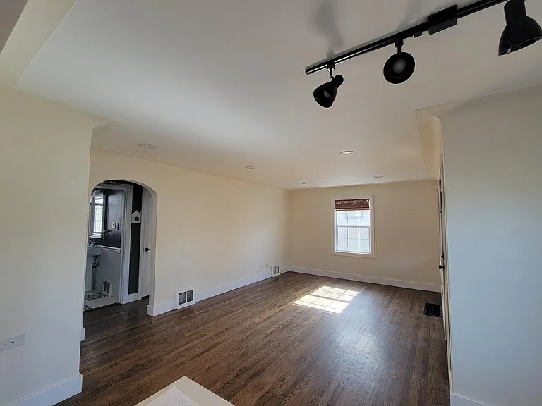 Refinished original hardwood floors, fresh paint & bamboo blinds throughout