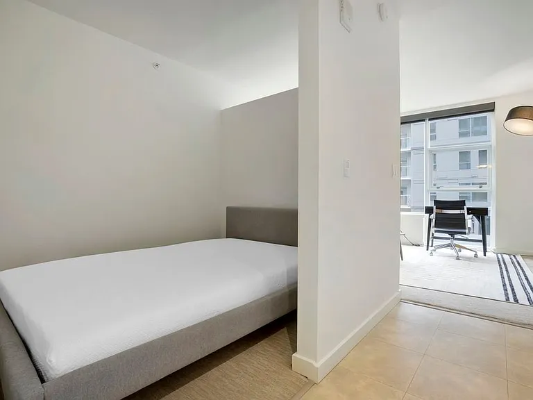 Furnished+ apartment homes feature a queen bed with mattress (Representative Image exact items and style of furnishings may vary)