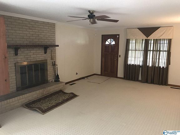LR w/ fireplace and hearth..