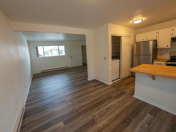 Kitchen/Dining room with view of living room.