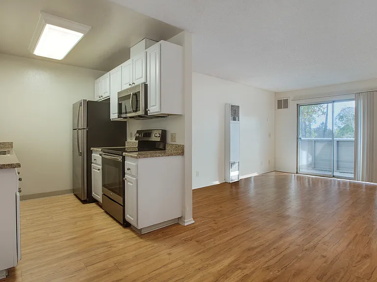Spacious living room with separate dining area