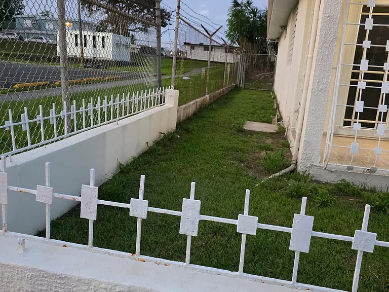 corner lot, outside of the house.