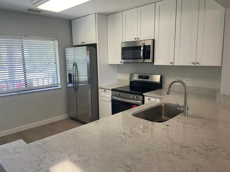 2091 NW 21st Ter #106 — Photo 2