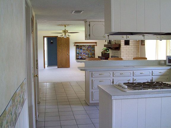 From Dinning, through Kitchen, into Living room