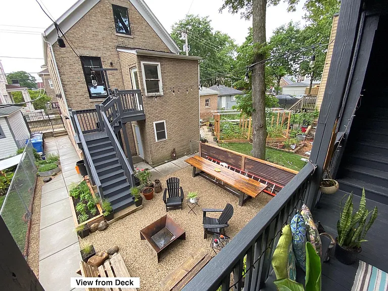 View of the shared courtyard. Hangout with other residents on the property. Garden, grill, or just hang out and listen to the birds.
