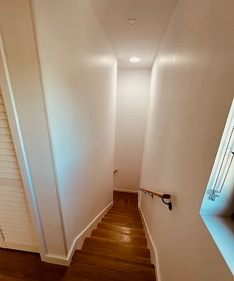staircase with solar tube for natural light