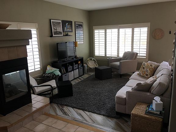 Living Room from dining area displaying newly installed tile