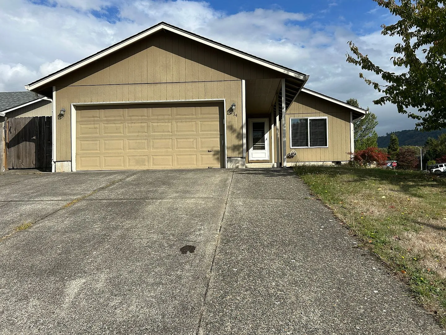 Three Bedroom Home with an Attached Garage — Photo 1