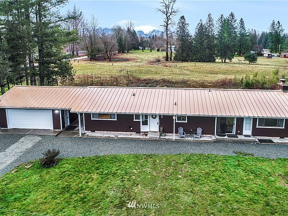 A true RANCH styled home on 2 acres of land. 