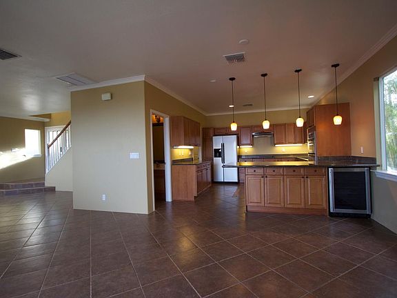 open kitchen with lots of cabinets