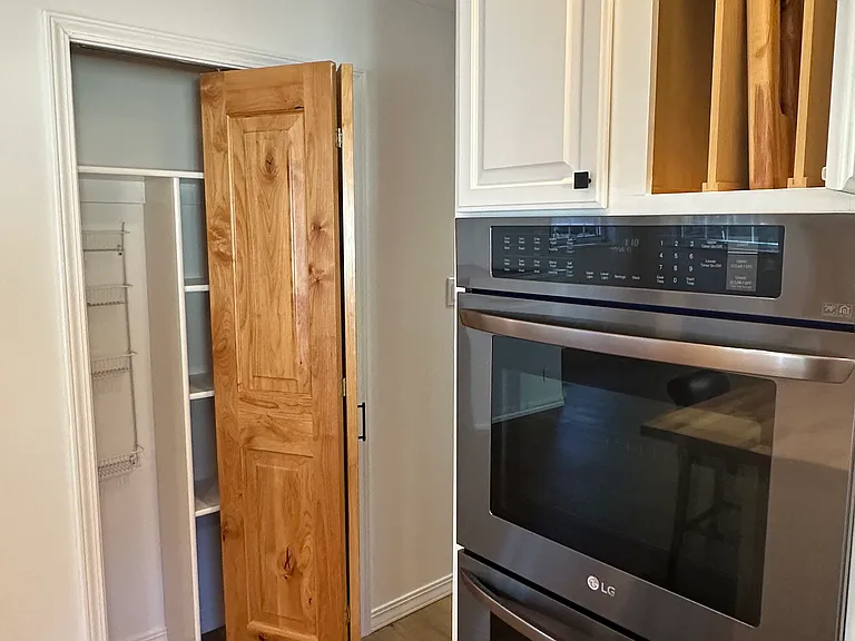 Pantry space across hall from kitchen