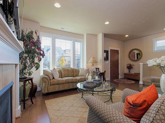 Living room and front entry.