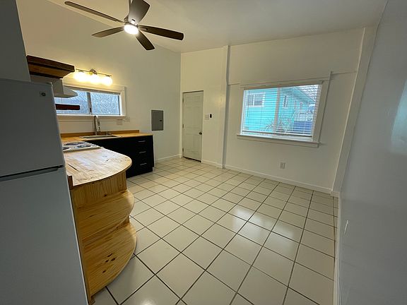 Kitchen & front room view from hallway