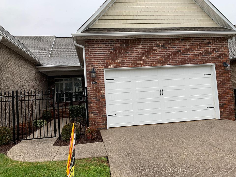 front entrance; aggregate drive & walk