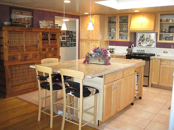 Kraft Maid kitchen with granite counter tops.