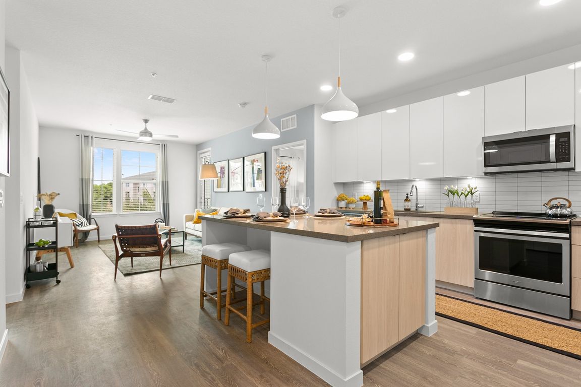 Open Floorplan View with Welcoming Kitchen