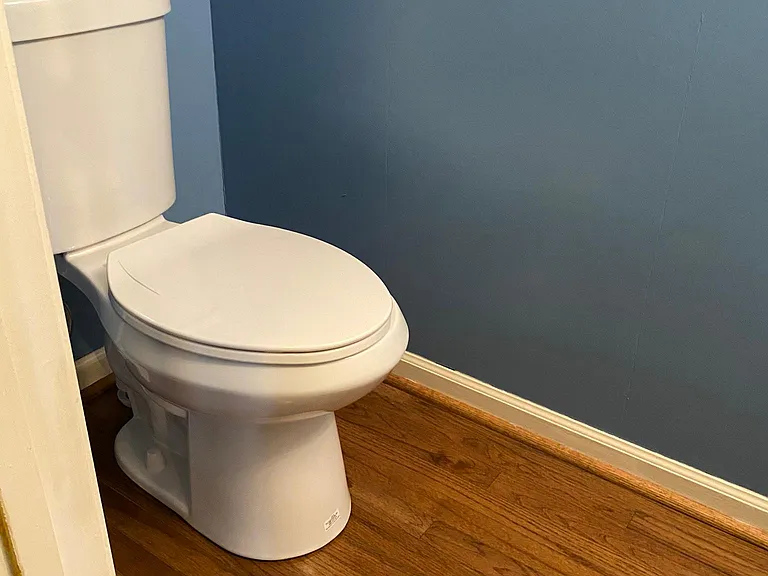 1/2 Bath Downstairs in Hallway by Living Room