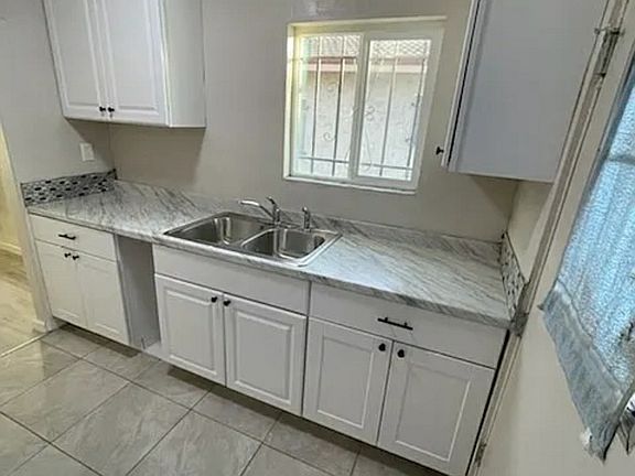 5th image of 7019 Marbrisa Ave #E