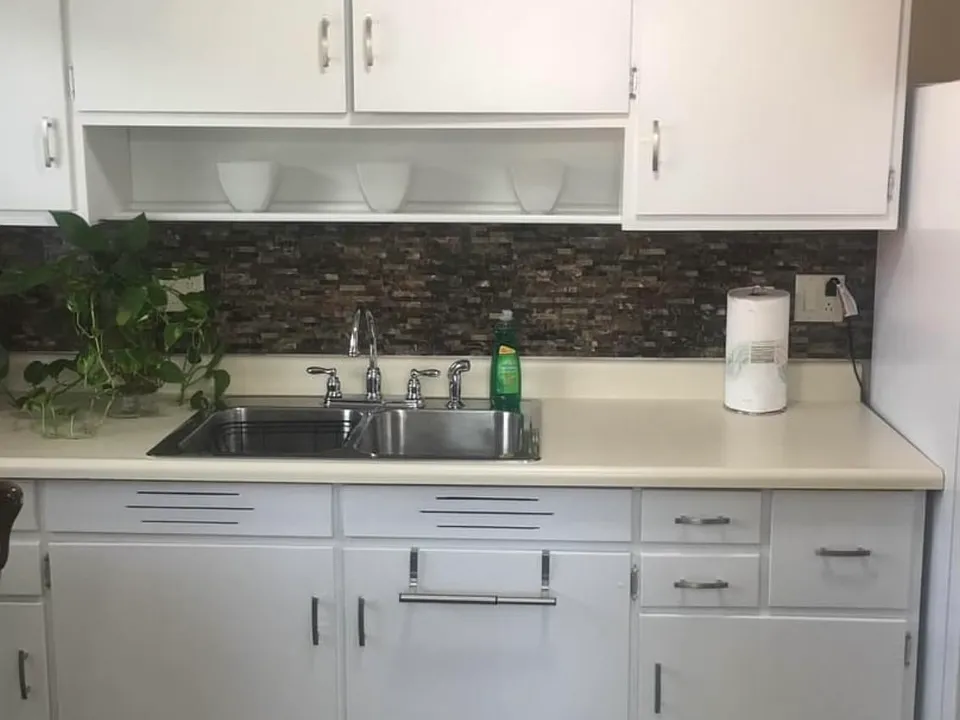 Kitchen, includes stove refrigerator, microwave.