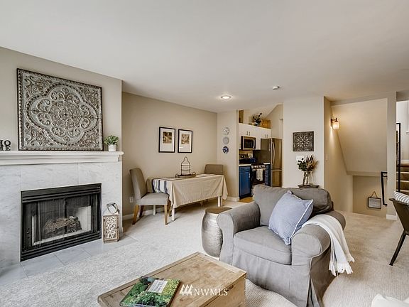 Relax and entertain on the main floor living space in front of your gas fireplace. 