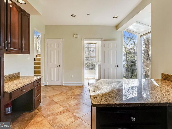 5th image of 5459 Whitley Park Terrace Townhouse #1