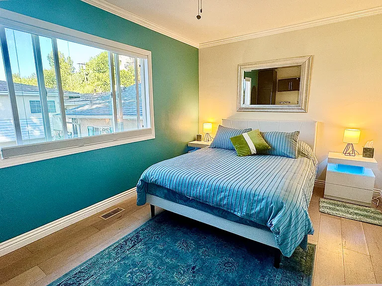Upstairs bedroom with queen size new mattress and workspace