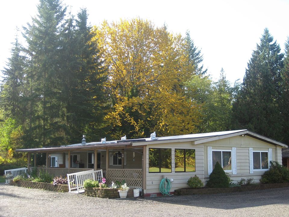 covered deck on front of house
