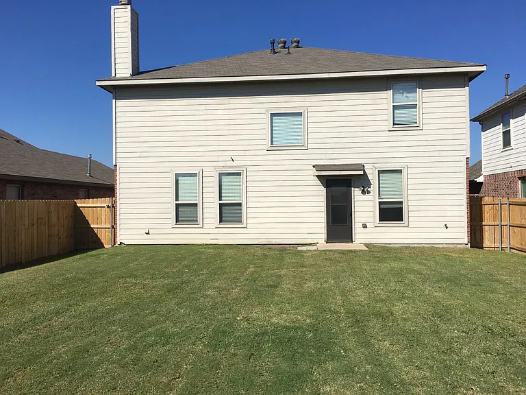 large fenced back yard