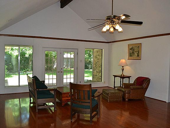 Gorgeous French doors open to lunch back yard