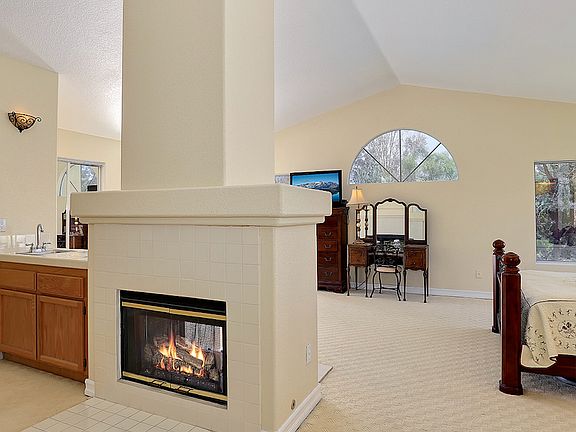 Master bed fireplace retreat