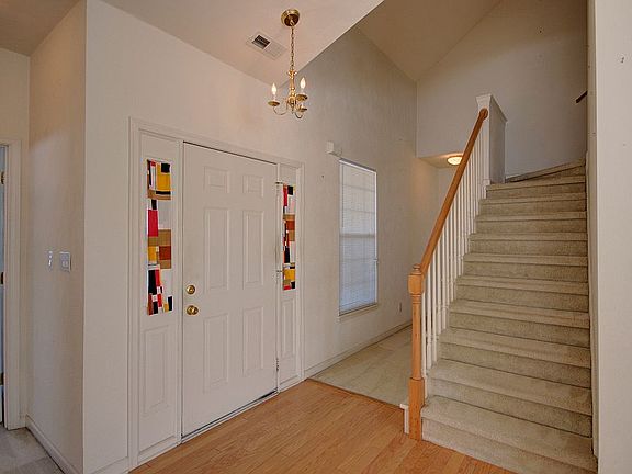 Foyer stairs to loft 2nd fl