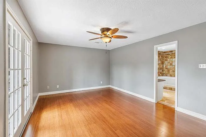 Master Bedroom with master bathroom and private balcony access.