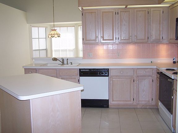 Stylish Kitchen to Right of Entrance Foyer