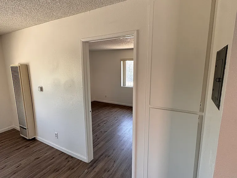 Open living space leading to bedroom