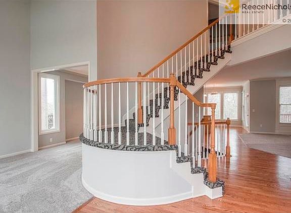 new carpet, new floors, beautiful staircase to open floor plan!