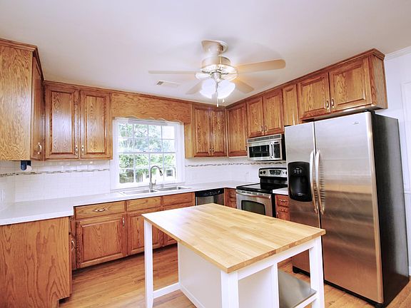 Kitchen with quartz countertops and stainless appliances