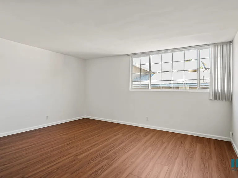 Bedroom with Hardwood Flooring