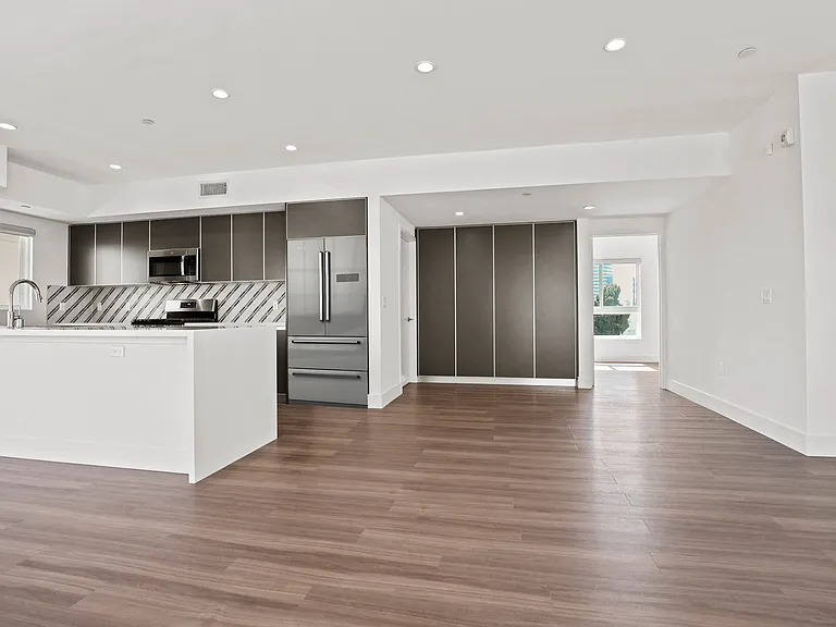 Kitchen and Dining Area with Built-In Cabinet Storage
